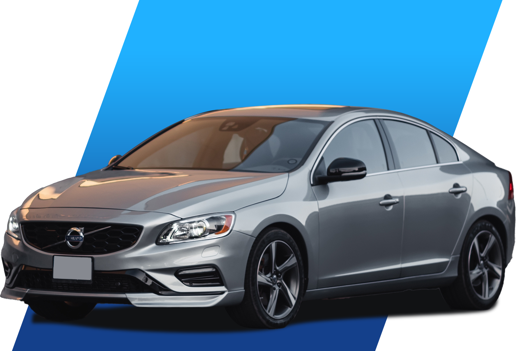 Silver Volvo sedan on blue background