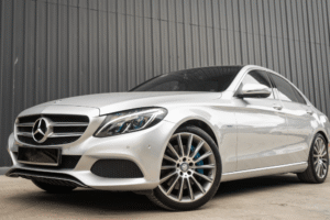 Airmatic suspension replacement in Vacaville, CA by Motoring Specialists. Image of a silver Mercedes sedan parked outside the shop, showcasing professional European auto service and precision maintenance for luxury vehicles.